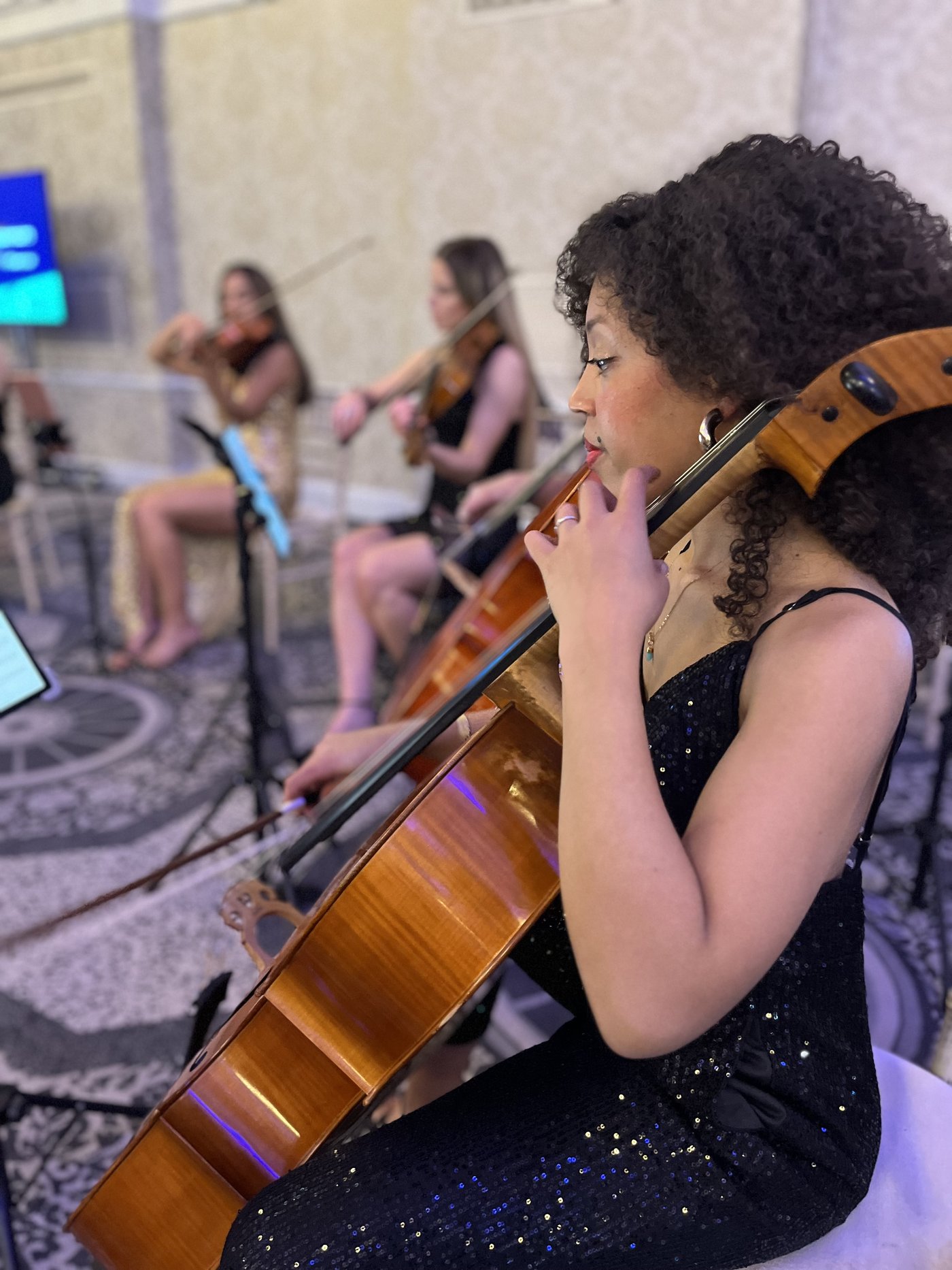 Secret Strings cellist performing — session musicians London